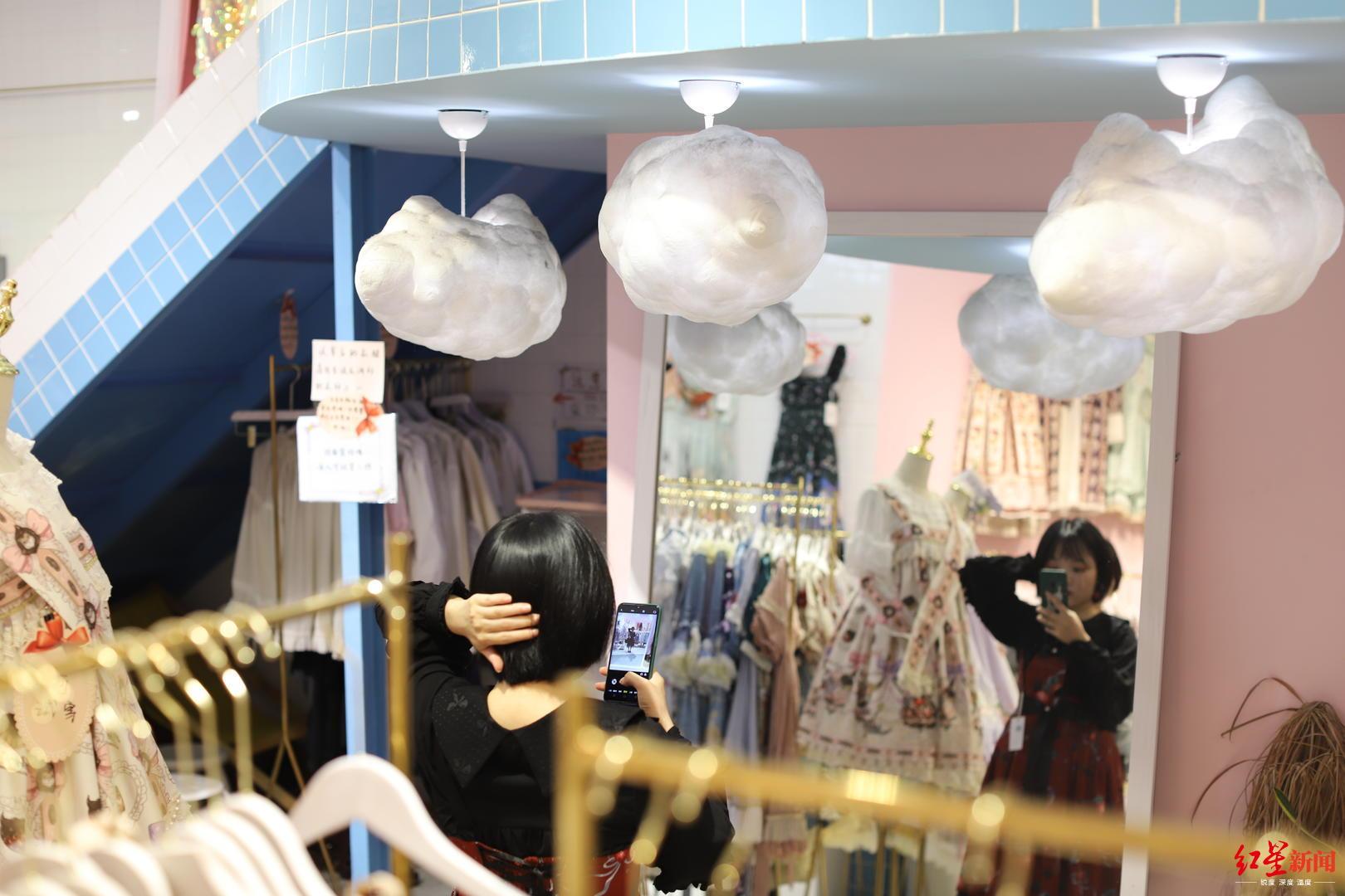 服装订做店装修图片_高级服装定制店装修效果图_服装店装修费用